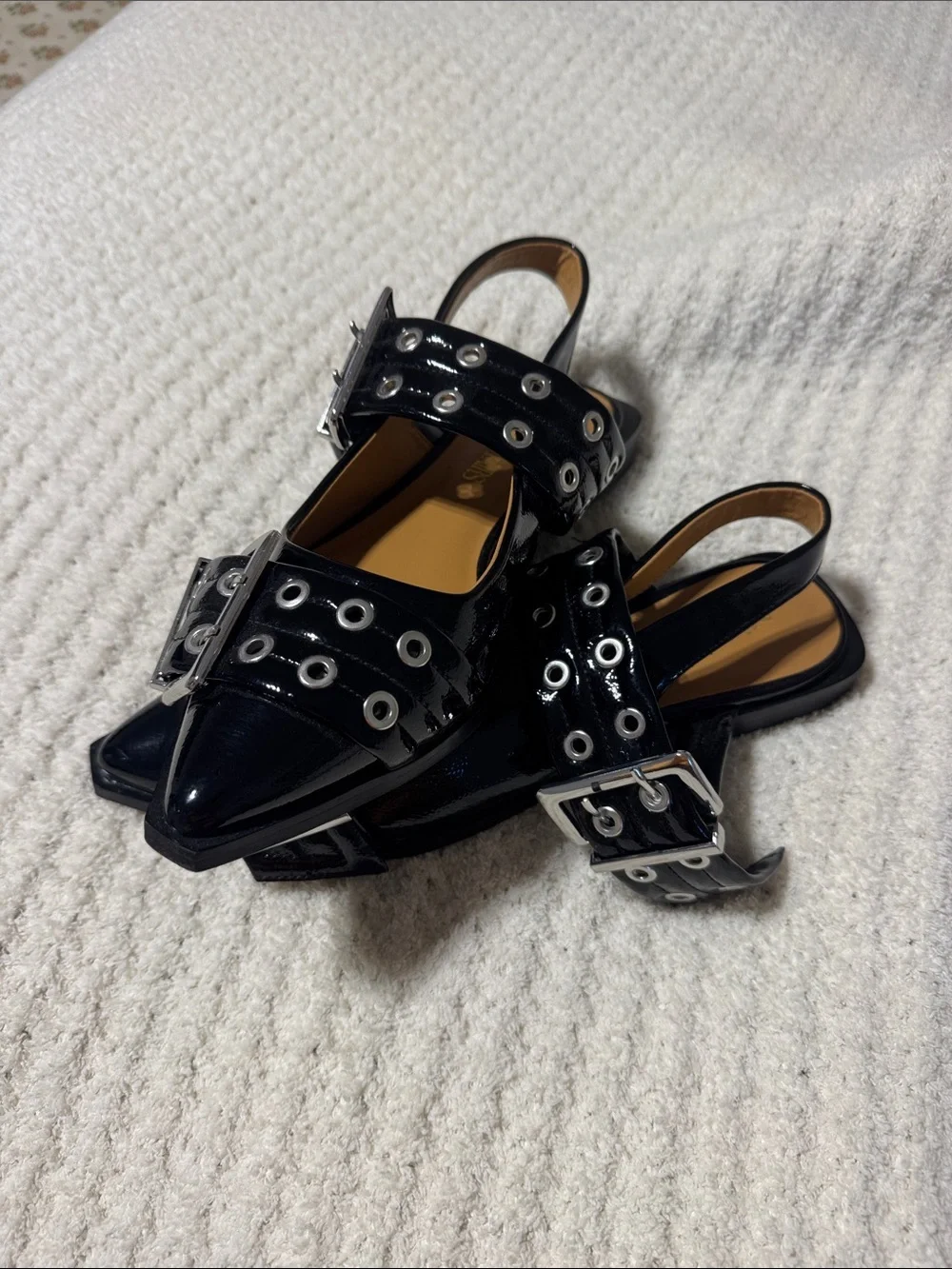 Patent leather eyelet flats